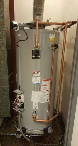 A new water heater installation with copper piping completed by Hessville Plumbing in Hammond, IN.
