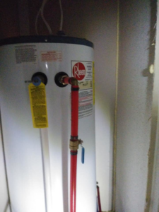 New PEX piping installed on a Rheem water heater by Home Solutions of Kansas City in Kansas City, MO