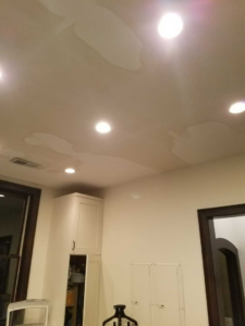 Visible water stains and damage on a ceiling, indicating a repair job for Emergency Response Team Nashville, TN