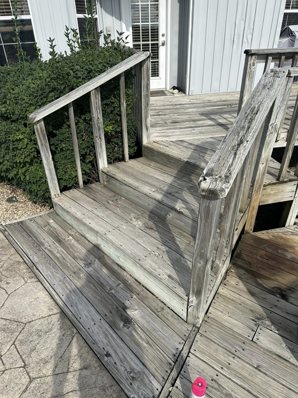 A weathered wooden deck needing repair and restoration services from Stone Valley System's Handyman in Springfield, MO.