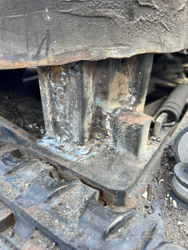 A close-up view of a welded metal structure, showcasing quality fabrication work by EGM Welding & Fabrication in Oklahoma City, OK.