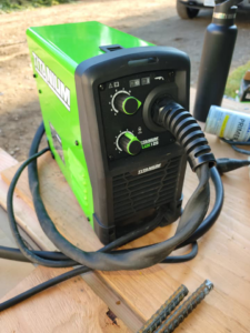 A welding machine and rebar on a job site, used by Smith Finishes LLC for handyman services in Everett, WA.