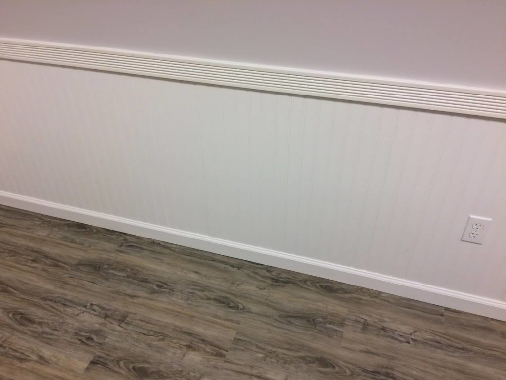 Professional installation of white beadboard wainscoting and trim by Excel Home Improvement And Services in Pawling, NY