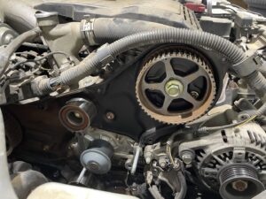 Close-up detail of a white kitchen cabinet with decorative crown molding by Camelback Cabinets in Gilbert, AZ