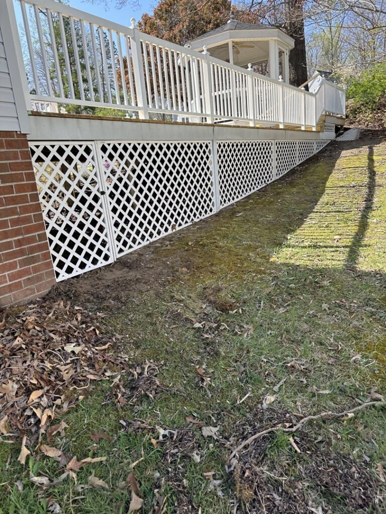White lattice deck skirting installation completed by Sanchez & Hall Construction in Richmond, VA.