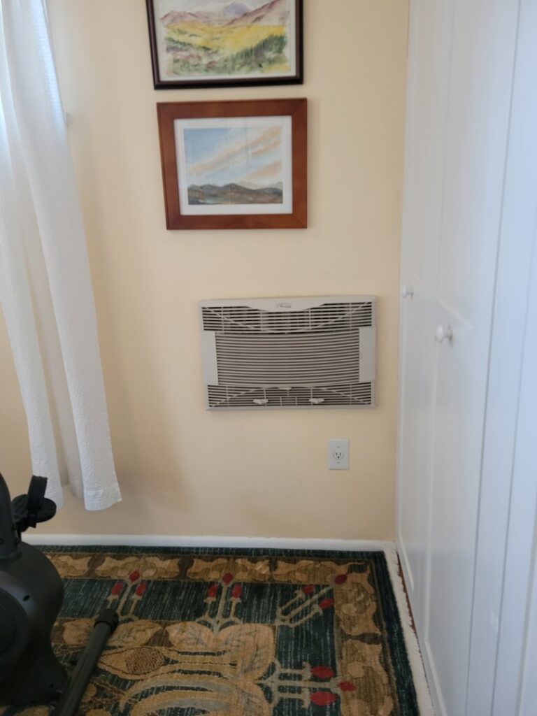 Window AC unit installation and interior wall work by Denver House Repair in Lakewood, CO.
