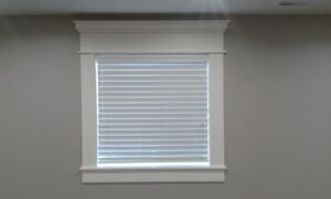 Newly installed window blinds and custom trim work by Eagle Rock Handyman Services in Caldwell, ID.