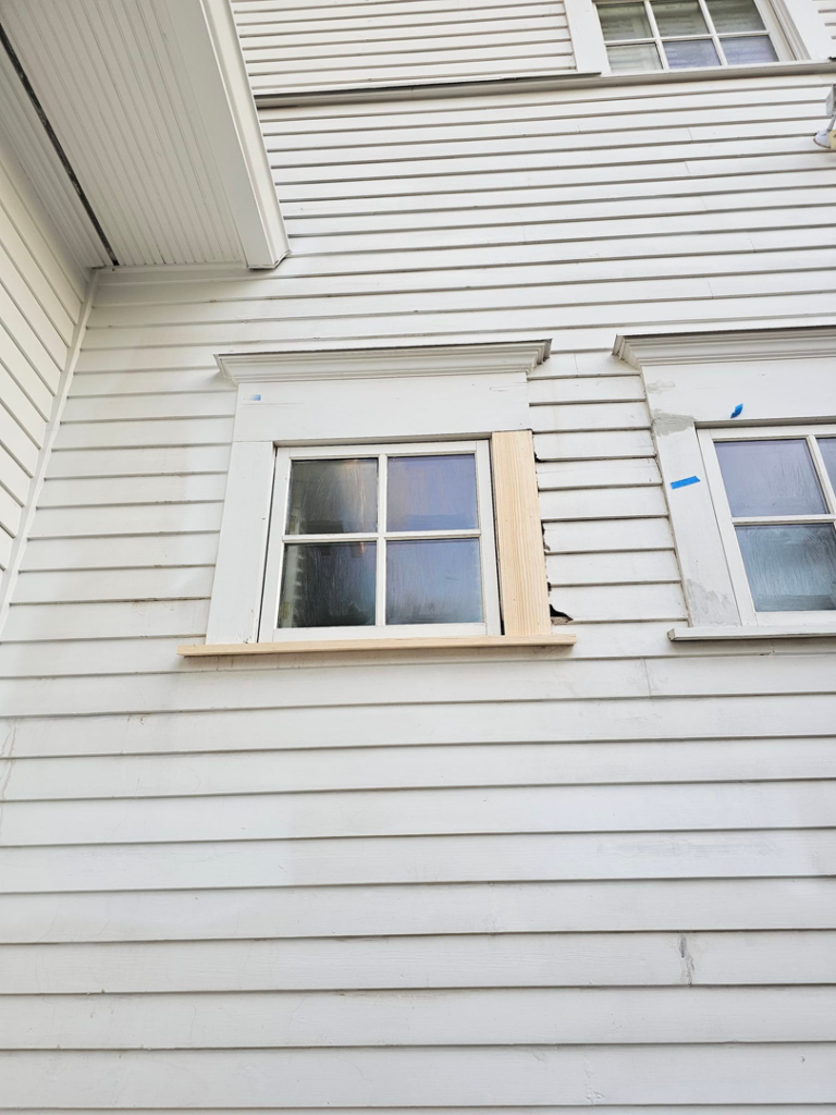 Exterior window trim repair in progress by KTL Home Repair and Remodeling in Norman, OK