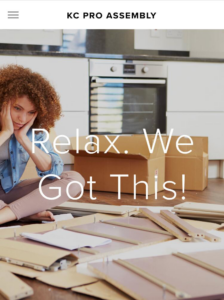 A woman looking frustrated with flat-pack furniture assembly, a common service offered by KC Pro Assembly in Kansas City, MO.
