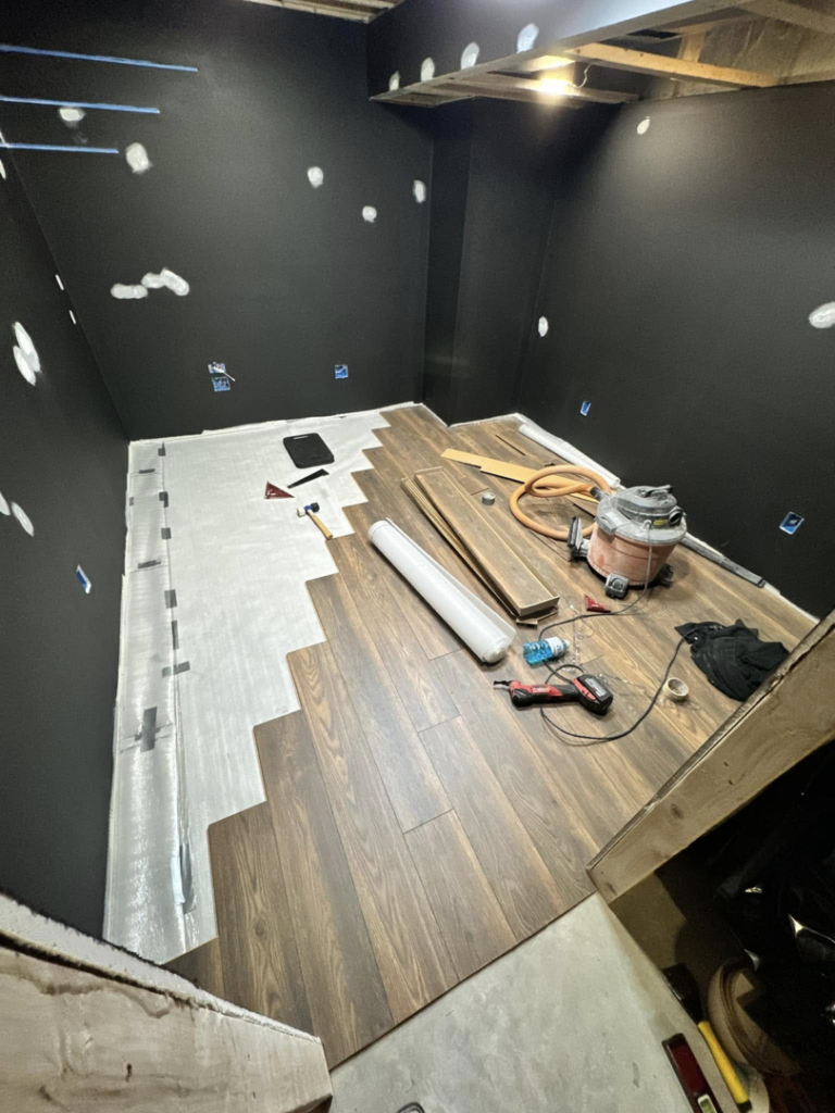 New wood flooring being installed in a room, a service provided by Armbruster General Contracting in Cincinnati, OH.