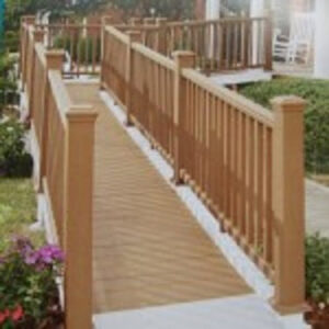 A newly installed wooden accessibility ramp with railings by Pocatello Handyman in Pocatello, ID