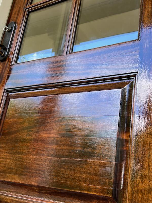 A beautifully stained and finished wooden door by Just Ducky Painting and Drywall Repair in Pegram, TN.