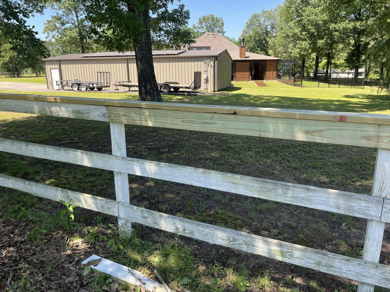 A wooden fence with new planks installed by S&S Handyman Services in Reno, NV