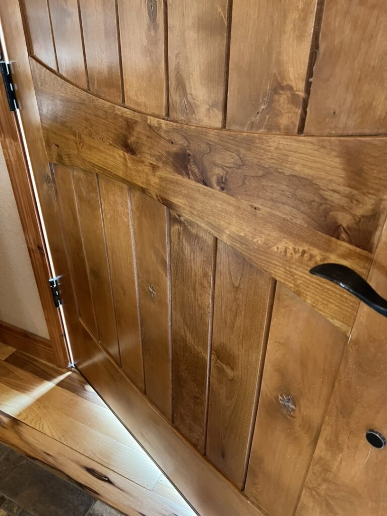 Close-up of a newly installed wooden interior door by High Plains Craftsmen in Cheyenne, WY.