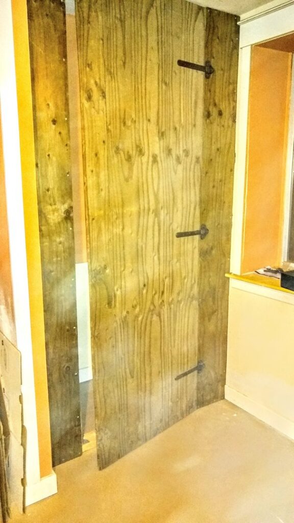 New wooden paneling installed on an interior wall by Shane's Handyman Service in Edmond, OK.