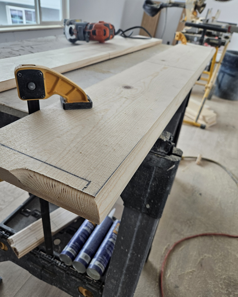 A woodworking project in progress, showing wood clamped to a workbench by Do It Right Or Do It Twice, LLC in Denver, CO.