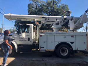 A GalCan Electric and General Contracting worker in a boom lift truck performing a job in New Orleans, LA.
