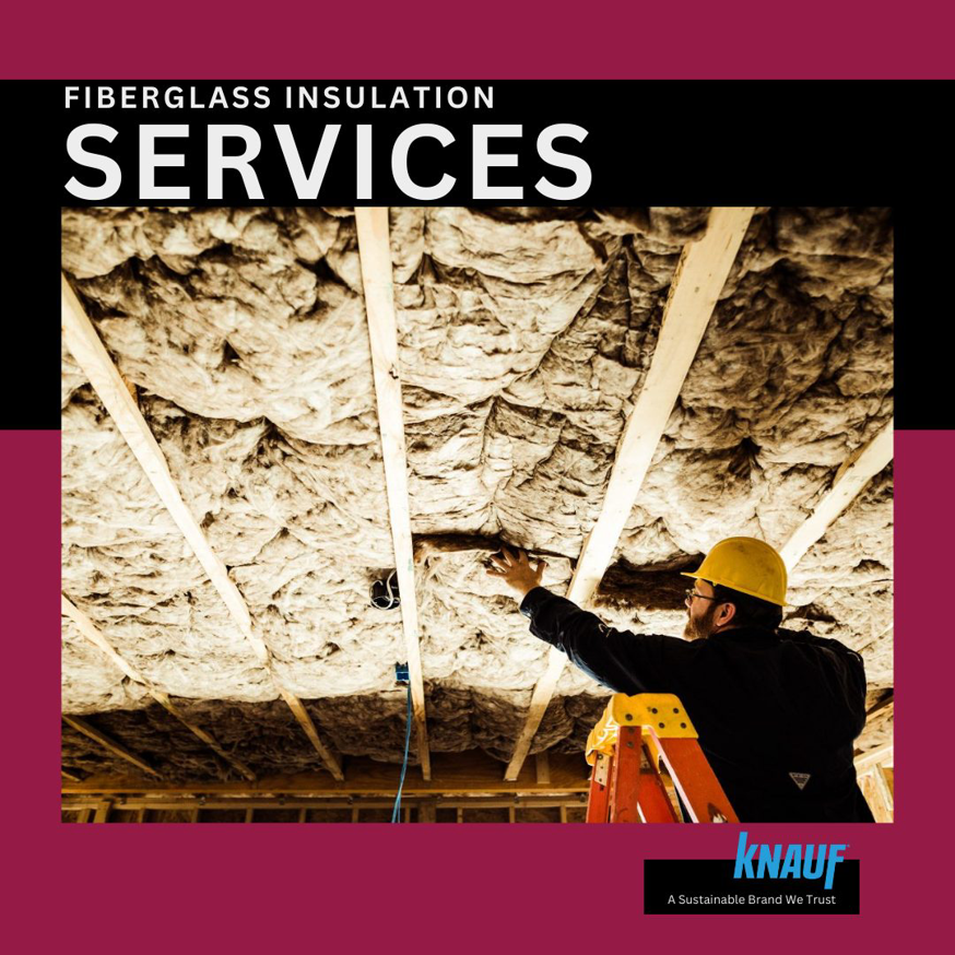 A worker installing fiberglass insulation for Whitson Insulation Company in Grand Rapids, MI.