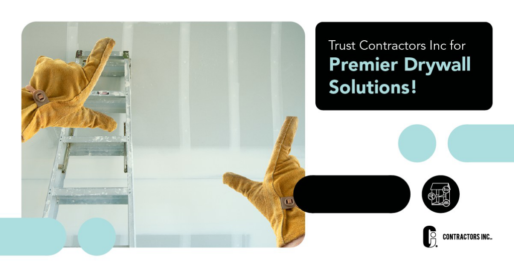 A worker pointing at newly installed drywall, showcasing services by Contractors Inc in Memphis, TN.