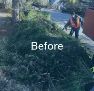 A worker in a safety vest removing a large pile of yard waste, demonstrating junk removal by 1-888-PIK-IT-UP in Cary, NC.