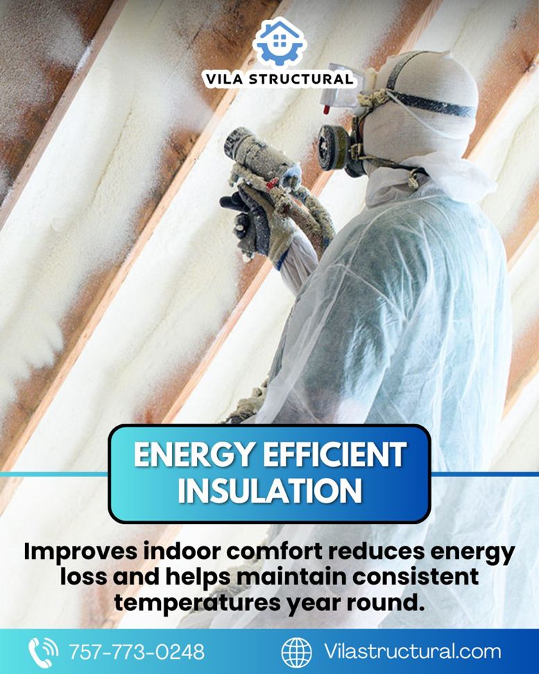 A worker in protective gear spraying foam insulation in an attic or crawl space for Vila Structural in Virginia Beach, VA.