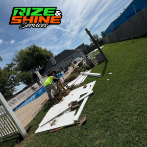 Workers digging a trench for fence installation or repair next to a pool by Rize and Shine Services in Owensboro, KY
