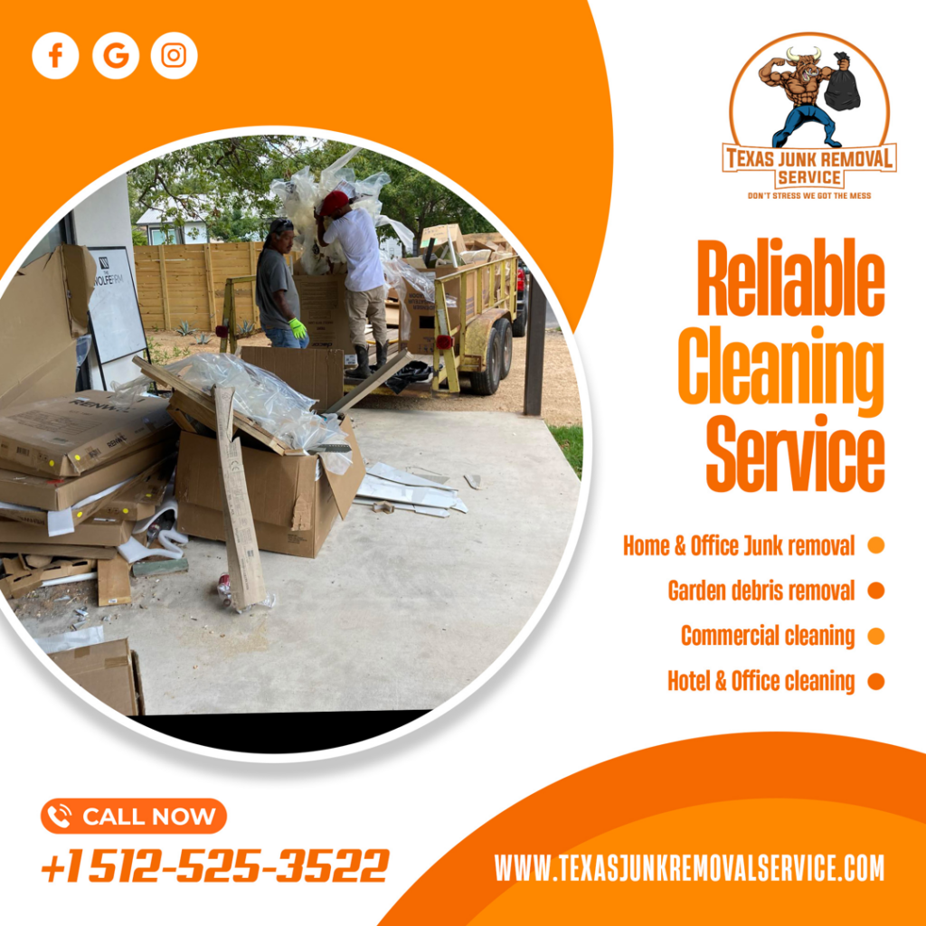 Workers from Texas Junk Removal Service loading cardboard boxes and debris onto a trailer in Austin, TX.