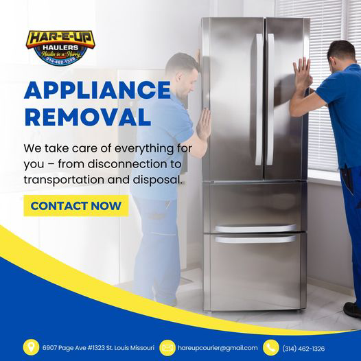 Workers carefully moving a large stainless steel refrigerator for appliance removal by Har-E-Up Haulers in St. Louis, MO