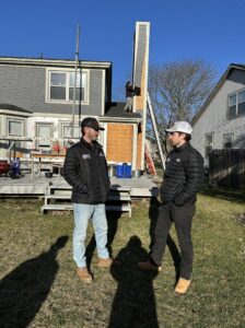 SHIFT Roofing & Exteriors workers on a job site with exterior renovation in progress in Gahanna, OH