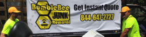 Workers from BumbleBee Junk removing an appliance and other items during a junk removal job in Sun Valley, CA