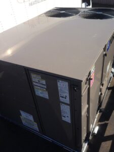 A large York brand HVAC unit, ready for recycling or removal by RZR Mechanical LLC in Phoenix, AZ.