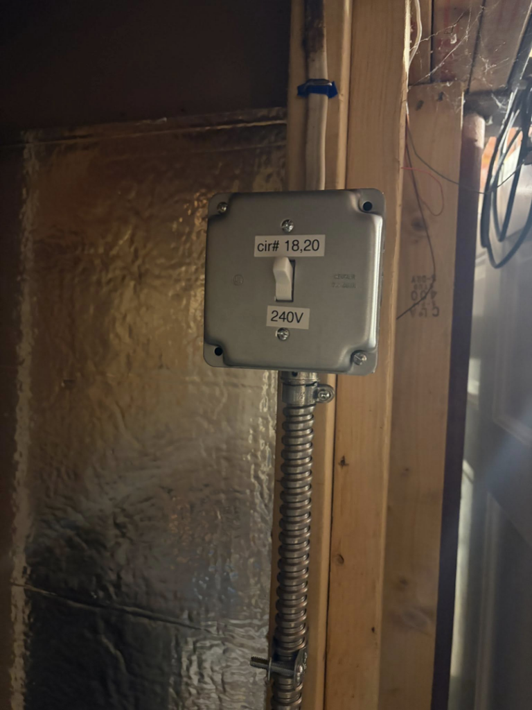 A 240V electrical switch box installation with conduit by Dartmouth Fire Protection Electrical Division in New Bedford, MA.