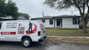 The A+ Floor Care service van parked in front of a residential home for a carpet cleaning appointment in Corpus Christi, TX.