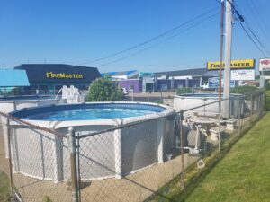 Multiple above-ground pools on display outside Firemaster in Oklahoma City, OK