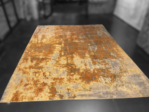 A large abstract design area rug, showcasing products available from FabriCare in Rockville, MD.