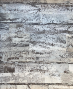 A close-up view of an abstract, textured rug pattern available at David Alan Rugs in Austin, TX.