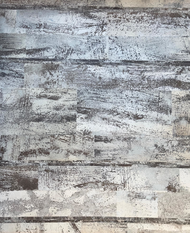 A close-up view of an abstract, textured rug pattern available at David Alan Rugs in Austin, TX.