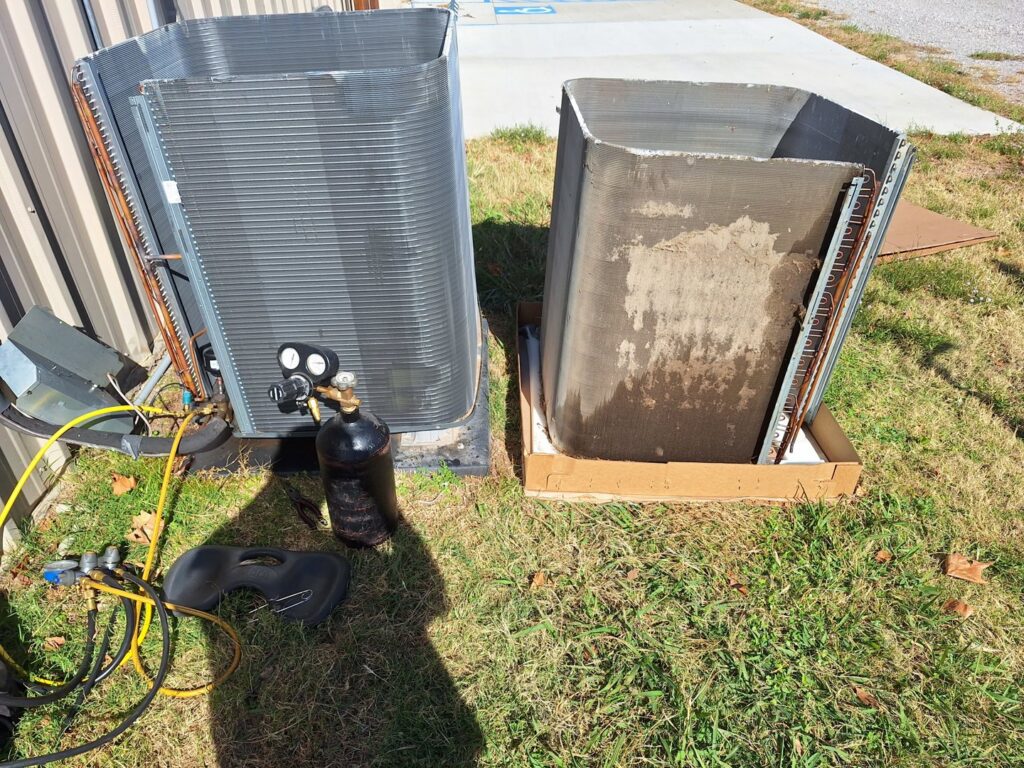 Old and new AC coils with HVAC tools, indicating a replacement or cleaning service by The Right Flow Heating and Air LLC in Lawton, OK