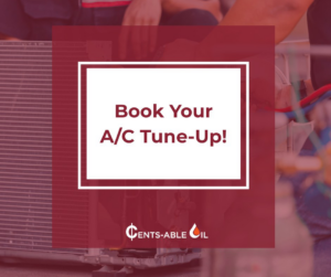 An outdoor AC unit being serviced for a tune-up by Cents-Able Oil, your HVAC contractor in New Haven, CT.