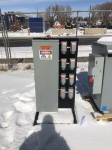 An electrical disconnect box installed for an outdoor AC unit by AMG Electric LLC Laramie, WY.