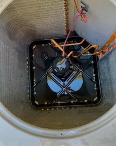 Close-up view of the interior components of an AC unit during maintenance by Nevada Heating Reno in Sparks, NV.