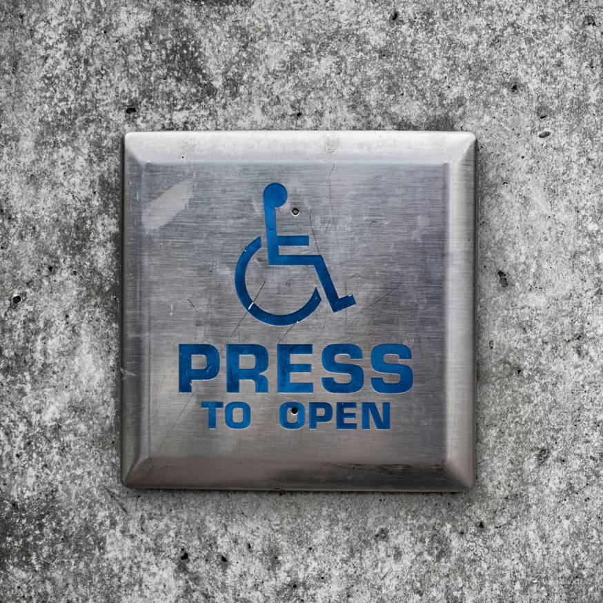 An accessibility 'Press to Open' button, installed by Access Hardware Inc in Honolulu, HI