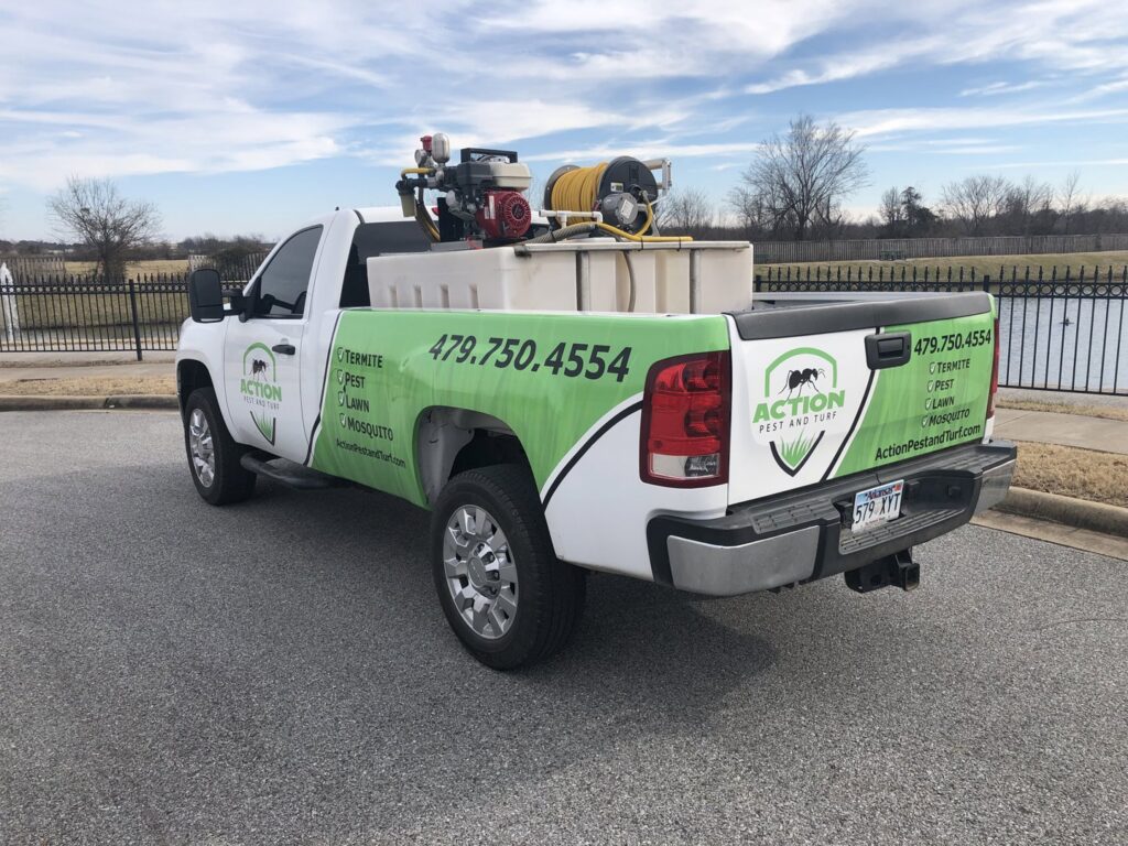 An Action Pest And Turf service truck equipped for pest and turf control in Springdale, AR.