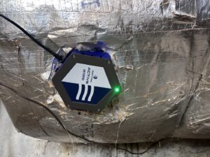 An Active Air Purifier device installed on HVAC ductwork, demonstrating indoor air quality services by Cool Runnings HVAC LLC in Salisbury, MD.