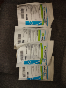 Packets of Advion Ant Insecticide, used for pest control services by Kingdom Pest Control & Services in Brooklyn Park, MN.