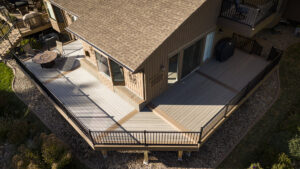 An aerial view of a custom deck with black metal railings installed by Babb Custom Fence in Sioux Falls, SD.