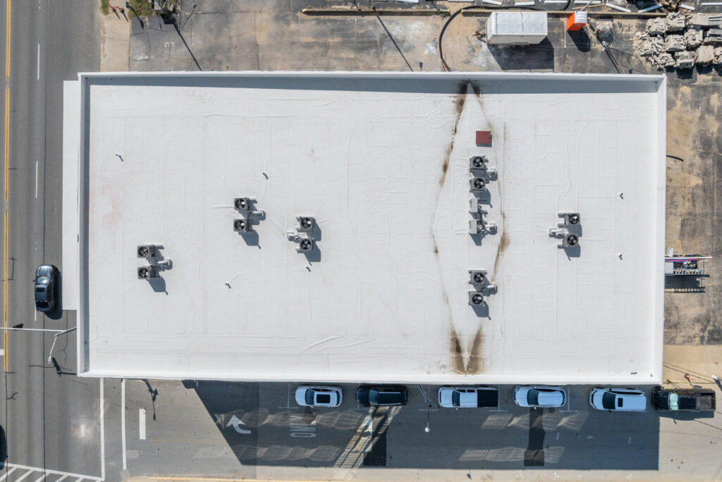 Aerial view of multiple rooftop HVAC systems on a commercial building by Brad Emberton's HVAC in Owensboro, KY.
