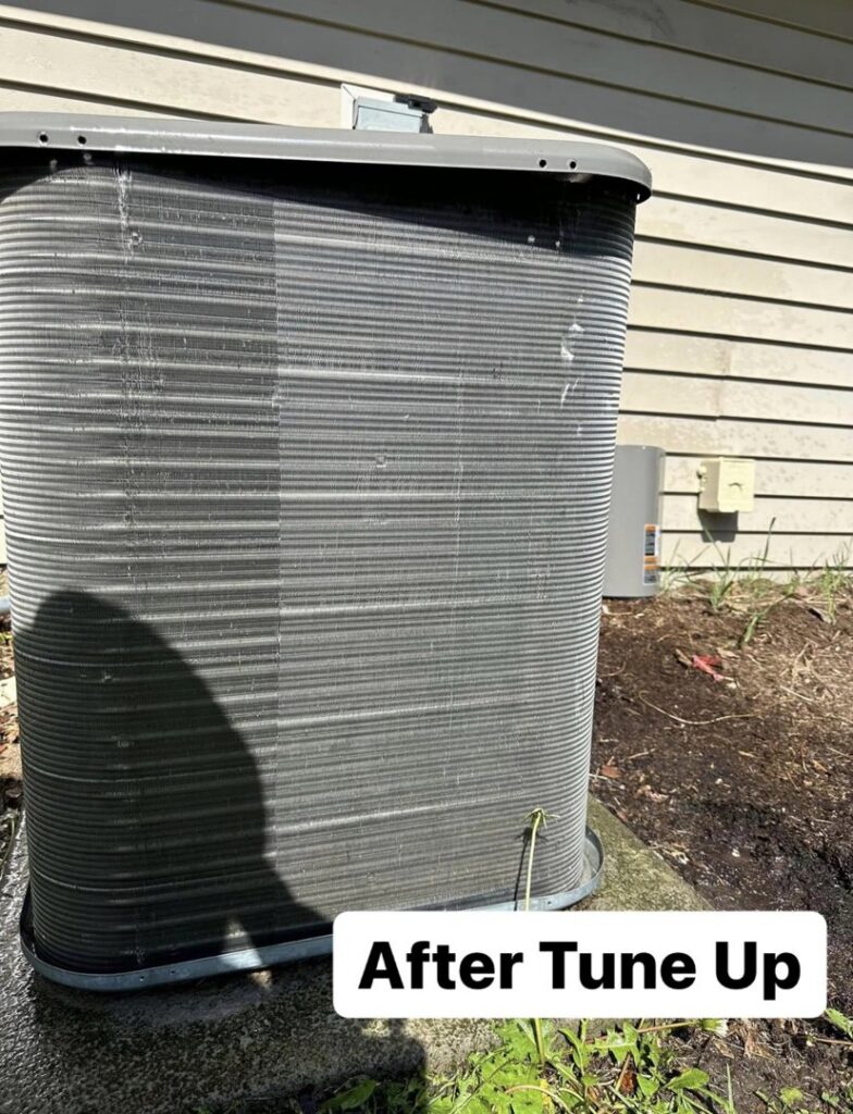 A clean outdoor air conditioning unit after a tune-up by Nacho Heating & Cooling Plus Co. in Crest Hill, IL