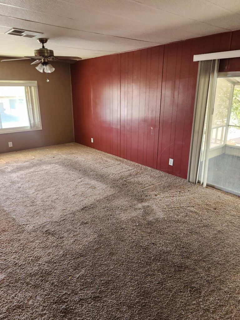 A clean, fluffy carpet in a room after professional cleaning by Extra Mile Floor Care in Mesa, AZ.