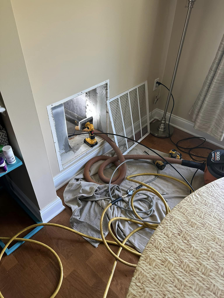 Air duct cleaning equipment set up in a home by Trenton Air Duct Cleaning Pros in Trenton, NJ.